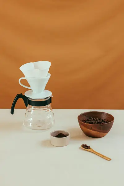 Premium coffee beans on a wooden table, showing the quality ingredients used in Irish cafes